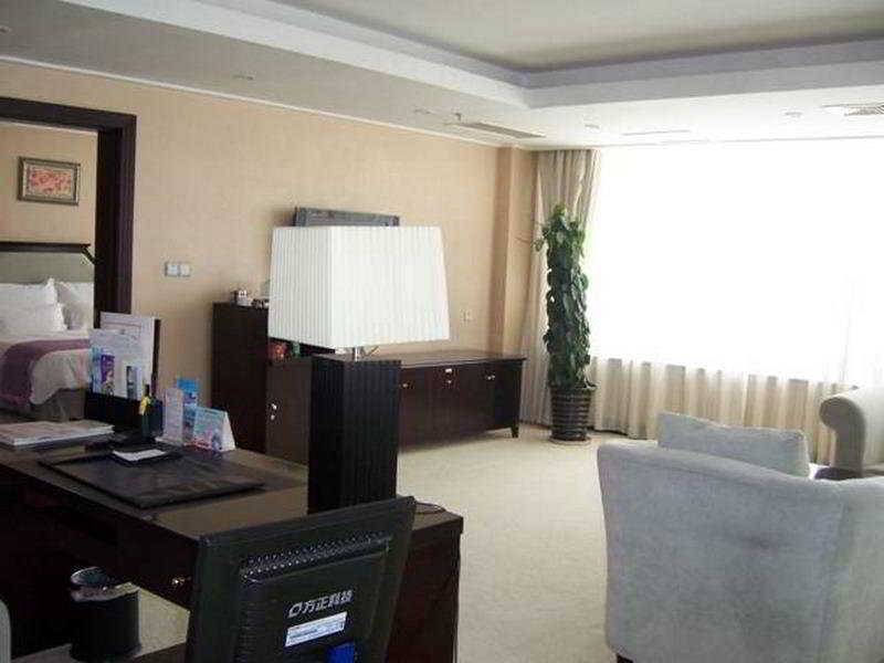 Sophia International Hotel Qingdao Quarto foto